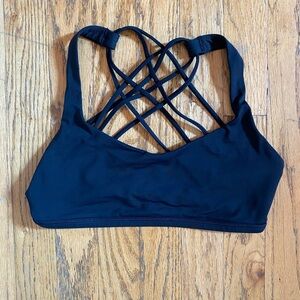 Black LuluLemon cross strap back sports bra